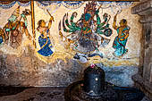 The great Chola temples of Tamil Nadu - The Brihadishwara Temple of Thanjavur. Linga with Nayaka painting on the inside wall of the cloister. 